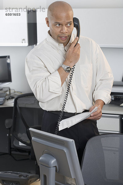 Businessman talking on phone