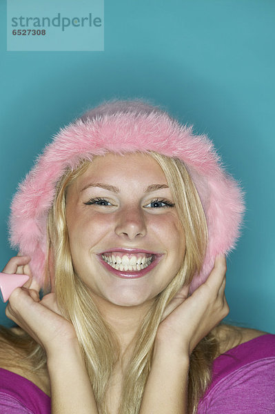 hoch  oben  nahe  lächeln  Hut  pink  Kleidung  Mädchen
