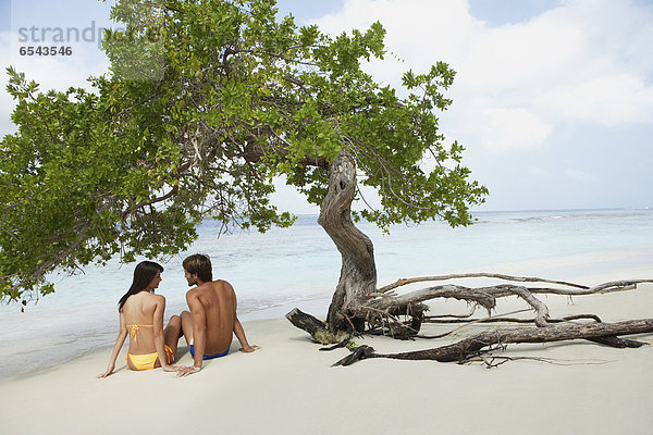 sitzend Strand Südamerika