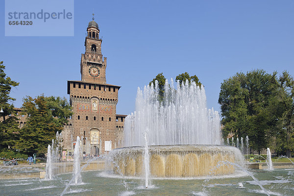 Italy  Milan  View of Sforza castle and fountain with blue sky