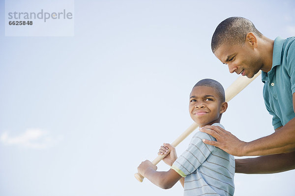 unterrichten  Menschlicher Vater  Sohn  Spiel  Baseball