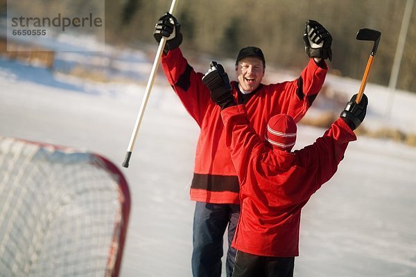 Zusammenhalt Menschlicher Vater Hockey spielen