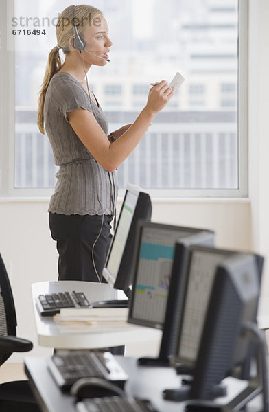 Businesswoman wearing headset