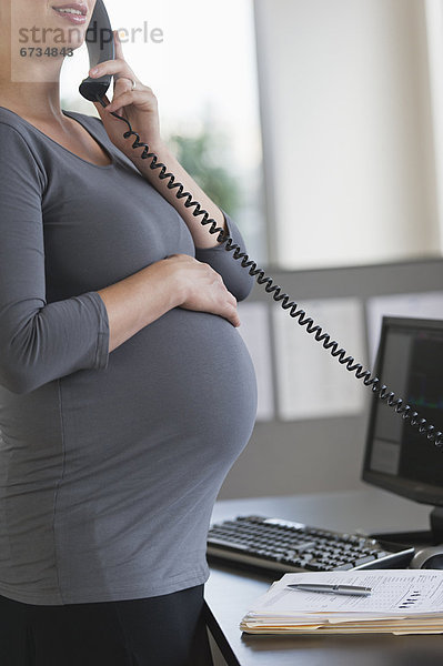 Frau  arbeiten  Schwangerschaft  Büro  jung