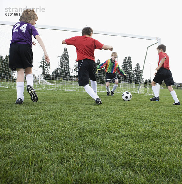 Junge - Person Wettbewerb Fußball spielen