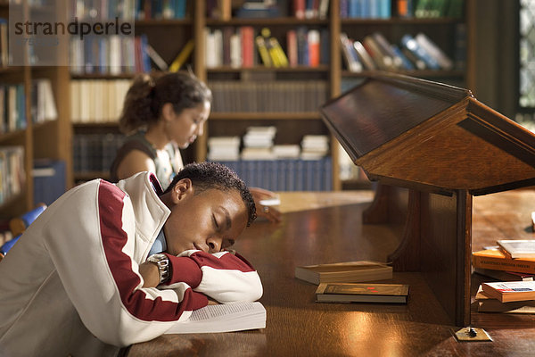 Students in Library  One Sleeping