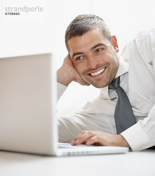 Businessman looking at computer