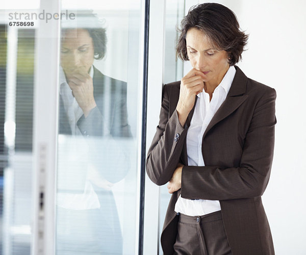 Contemplative businesswoman