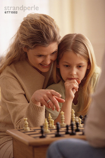 Schach Tochter Mutter - Mensch spielen