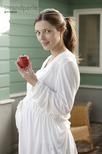 Portrait  Erwartung  Apfel  essen  essend  isst  Mutter - Mensch