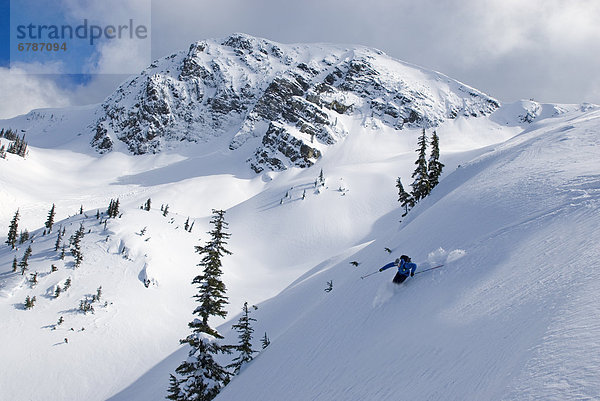 Skifahrer  Gesichtspuder  Cascade Mountain  unterhalb  British Columbia