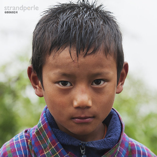 Portrait Of Bhutanese Boy  Punakha Valley Bhutan