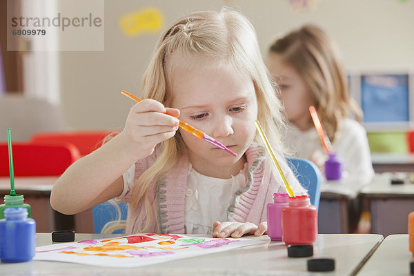 Children (4-5  6-7) during art classes