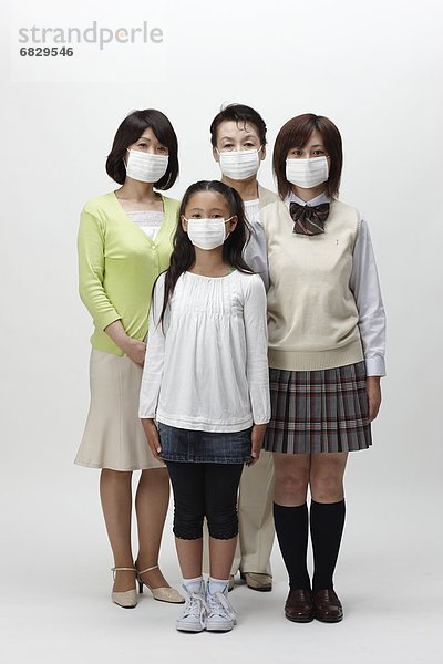Frau  Chirurgie  Mehrgenerationen Familie  Kleidung  Maske
