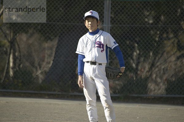 stehend  Junge - Person  Baseball