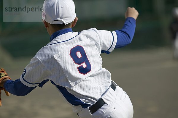 Tiefenschärfe  Teamwork  Junge - Person  Feld  Baseball