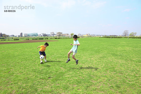 Junge - Person Feld jung Fußball Tokyo Hauptstadt spielen