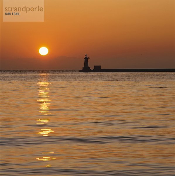 Silhouette  über  Ozean  Sonnenaufgang  Kai  Leuchtturm  Hokkaido  Japan