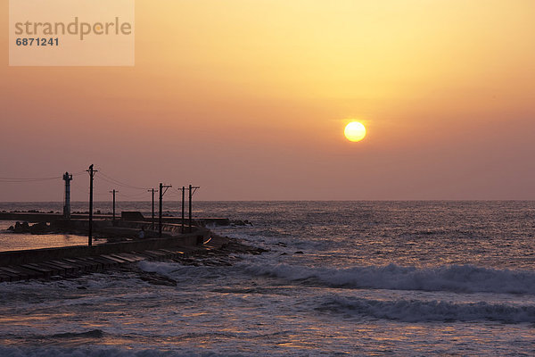 Sunset Over the Ocean  Silhouette of Pier