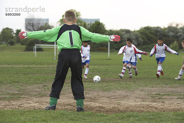 Junge - Person Fußball spielen
