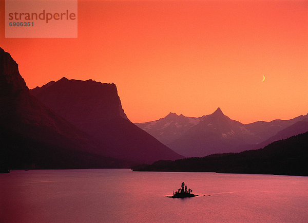 Vereinigte Staaten von Amerika  USA  Sonnenuntergang  See  ungestüm  Heiligtum  Insel  Jungfrau Maria  Madonna  Glacier Nationalpark  Gans