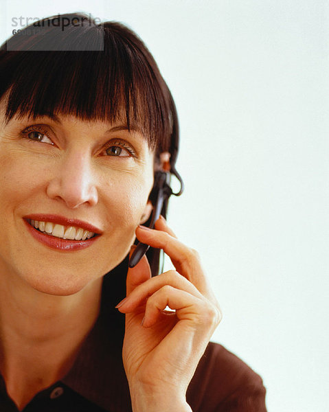 benutzen  Portrait  Geschäftsfrau  Telefon  Headset