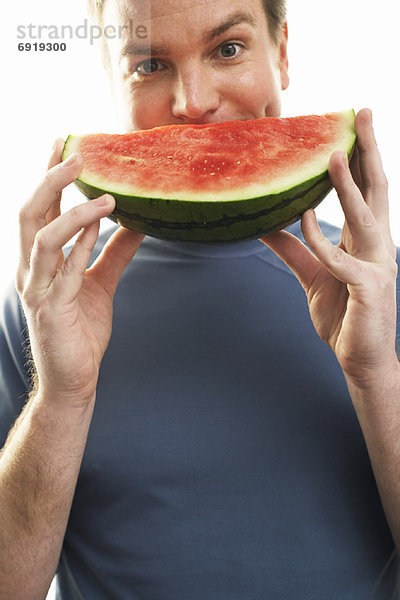 Mann hält Watermelon