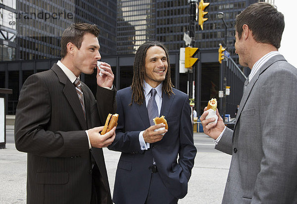 Hot Dog Hot Dogs Geschäftsmann essen essend isst