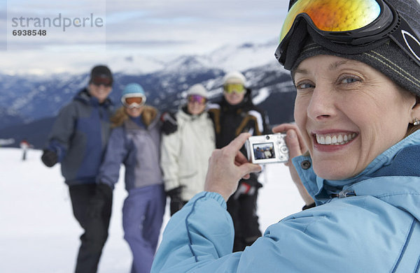 Frau Fotografie nehmen Hügel Ski