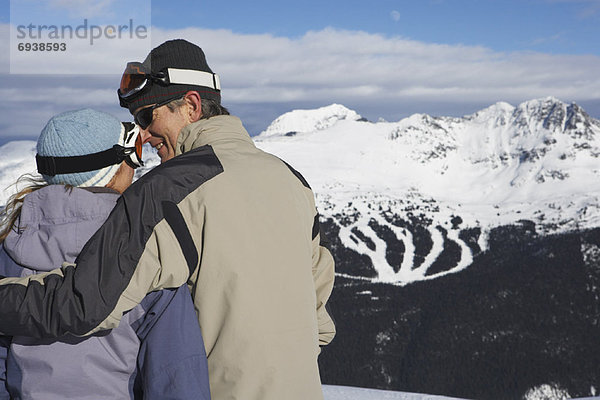 Couple on Ski Hill  Whistler  BC  Canada