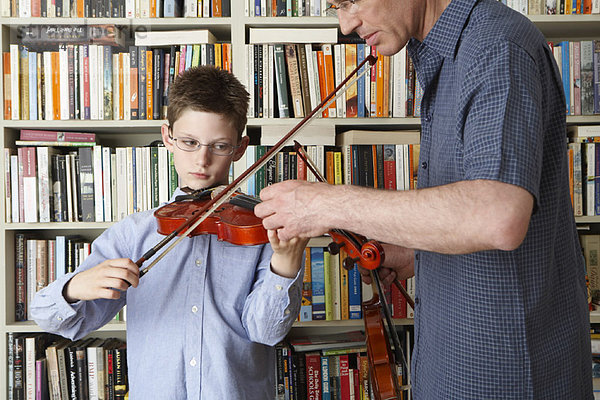 unterrichten  Menschlicher Vater  Sohn  Spiel  Geige