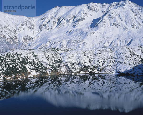 Schneedecke  Berg  See