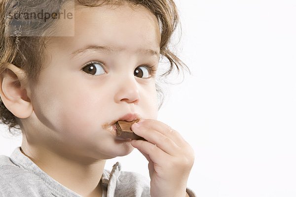 klein  Schokolade  essen  essend  isst  Mädchen