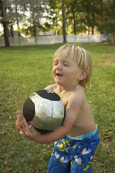 Junge - Person fangen Football