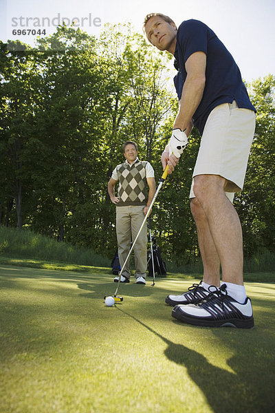 Männer Golfen