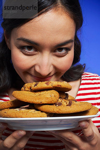 Woman Holding Plate von Cookies