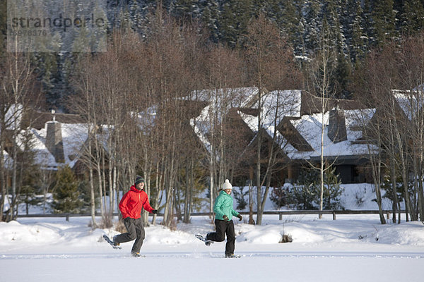 Couple Snowshoeing  Whistler  British Columbia  Canada