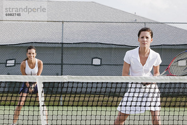 Frau  2  spielen  Tennis