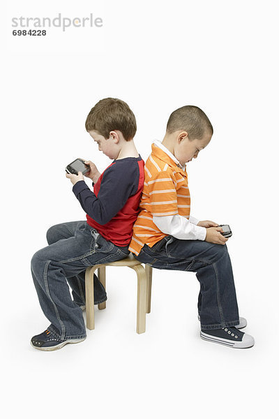 sitzend  Junge - Person  Spiel  Camcorder
