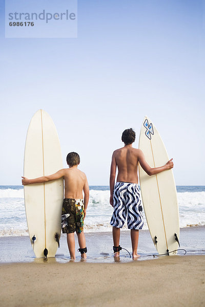 Junge - Person halten Surfboard