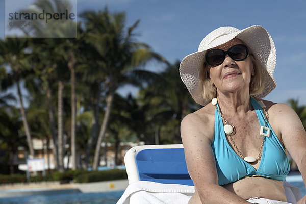 Woman Sunbathing by Pool  Cayo Coco  Cuba