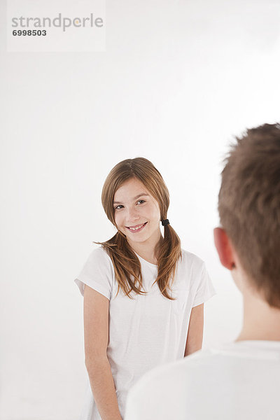 Girl Smiling at Boy