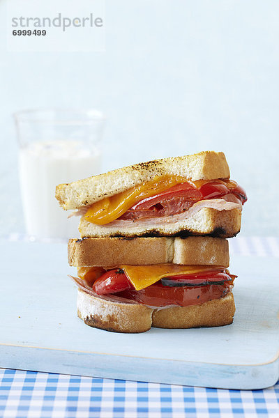 Grilled Cheese Sandwich with Ham  Peppers and Tomatoes