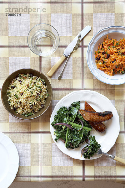 Kale and Sausages  Grain Salad and Carrot Salad