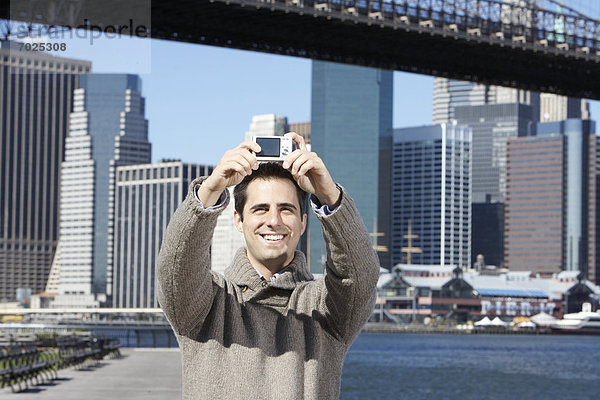 Vereinigte Staaten von Amerika  USA  Skyline  Skylines  Mann  New York City  Fotografie  nehmen  Hintergrund