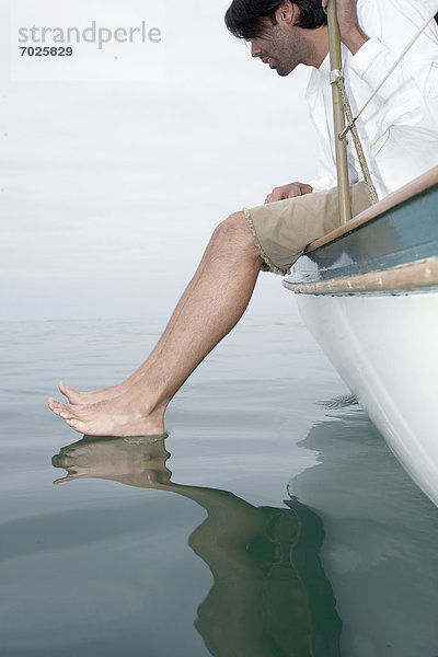 niedrig  sitzend  Wasser  Mann  Ecke  Ecken  Boot  Ansicht  Flachwinkelansicht  Winkel  dippen