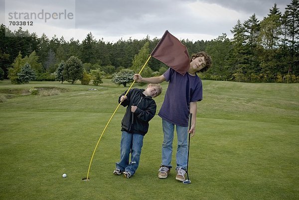 Spiel  Junge - Person  2  Golfsport  Golf  Kurs