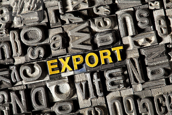 'Alte Bleilettern bilden das Wort ''EXPORT'''