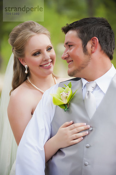 USA  Texas  Bride and groom smiling  close up