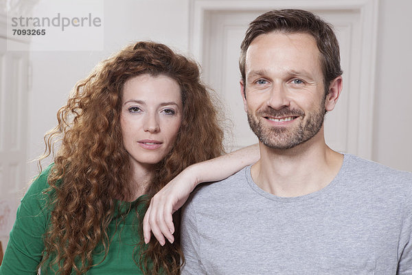 Germany  Berlin  Portrait of couple at home